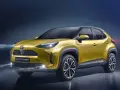 Toyota Yaris Cross Hybrid gialla, con dettagli che suggeriscono la corretta pressione gomme yaris cross per un'ottimale tenuta di strada.