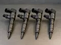 Quattro iniettori common rail, componenti cruciali per evitare problemi ai motori diesel.