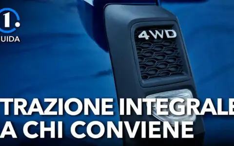 Dettaglio di un'auto con scritta "4WD". La guida esplora i **svantaggi trazione integrale** e a chi conviene.