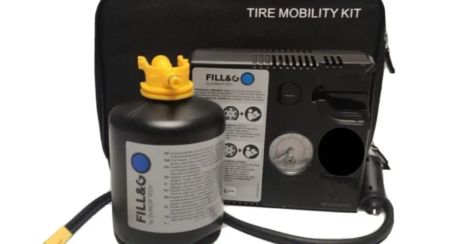 Kit di riparazione pneumatici: una bombola sigillante e un compressore per gonfiare e riparare la gomma in caso di emergenza.