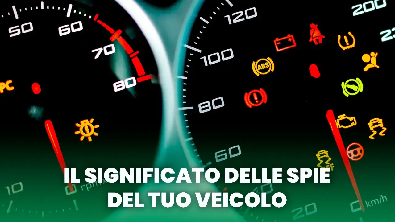 Cruscotto con spie rosse accese, tra cui quella del motore e dell'ABS. Testo: 