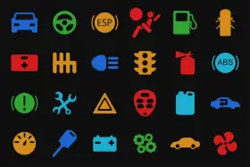 Icone colorate su sfondo nero: cruscotto auto, cambio, spie motore benzina, ABS, batteria, ruote, ecc.